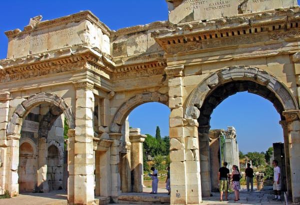 The triple-arched Mazaeus and Mithridates Gate beside the Library of Celsus