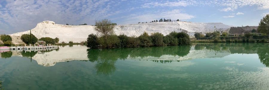 The white travertine terraces of Pamukkale filled with thermal water