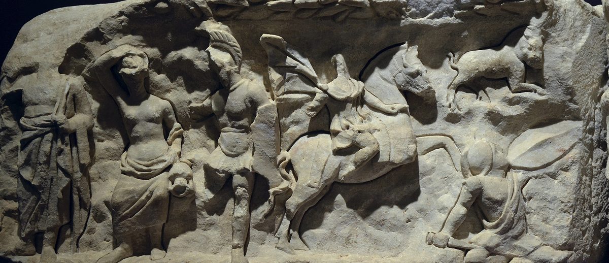 A marble relief frieze from the Temple of Hadrian in the Ephesus Museum, showing Androclus hunting the boar